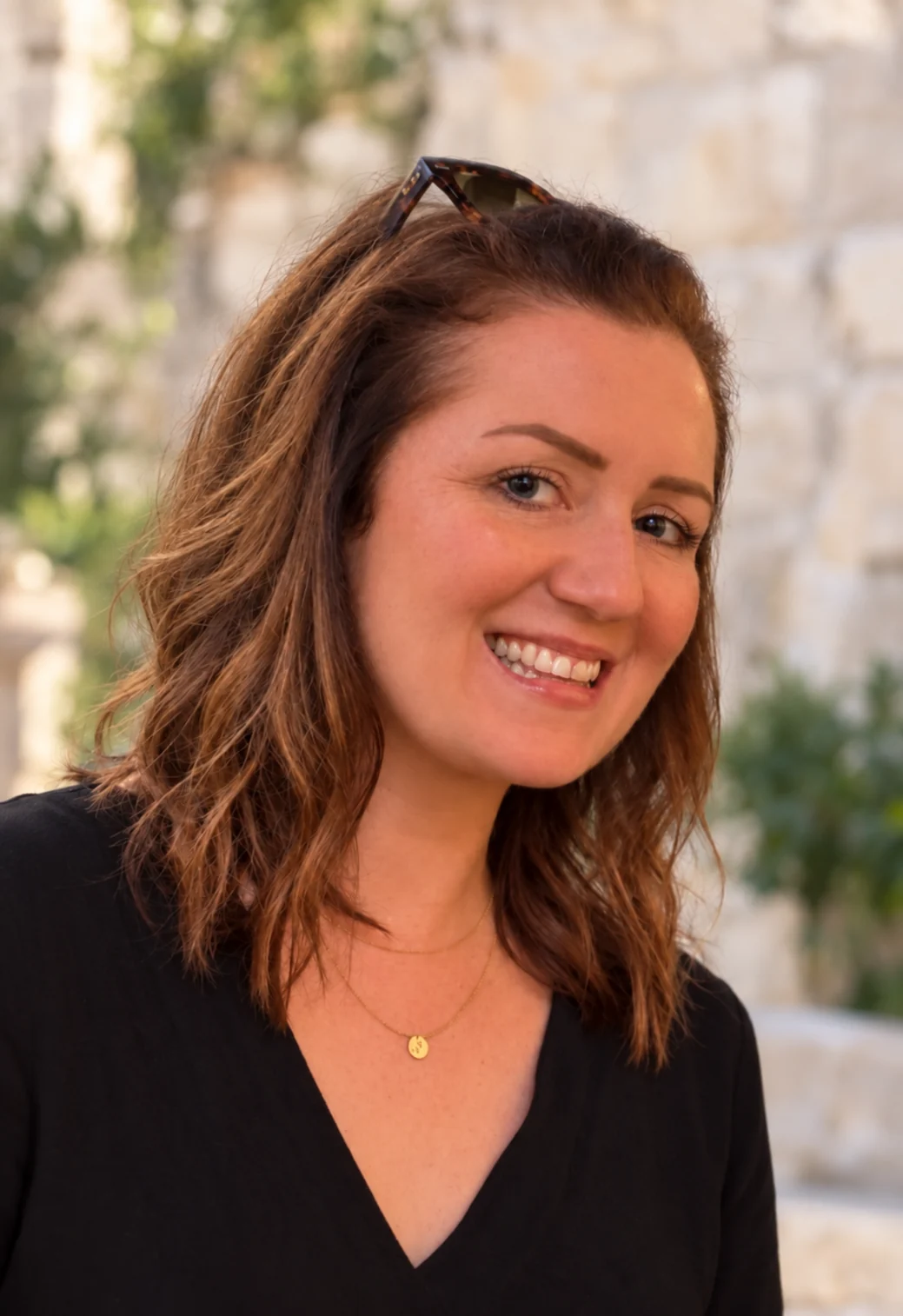 Julie McNamara smiling outdoors